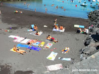 Playa de San Juan Beach Sunbathing